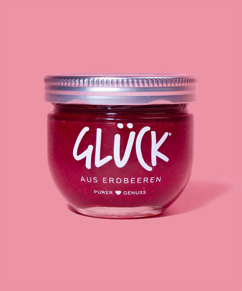 Marmelade auf rosa Hintergrund