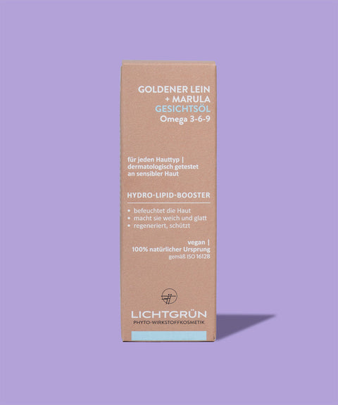 Gesichtsöl auf lila Hintergrund