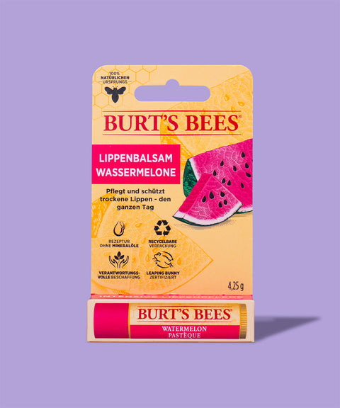 burt's bees lippenbalsam wassermelone, gelbliche verpackung auf lilanen hintergrund