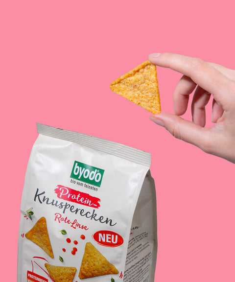 Knusperecken auf rosa Hintergrund