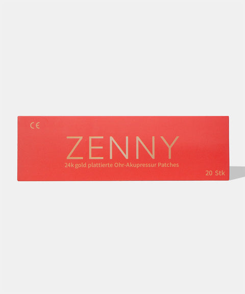orangene zenny verpackung auf grauen hintergrund